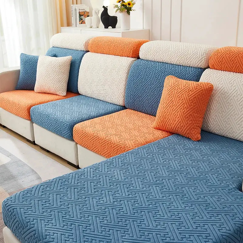 Stretchable jacquard sofa slipcover set in blue and orange with matching cushions