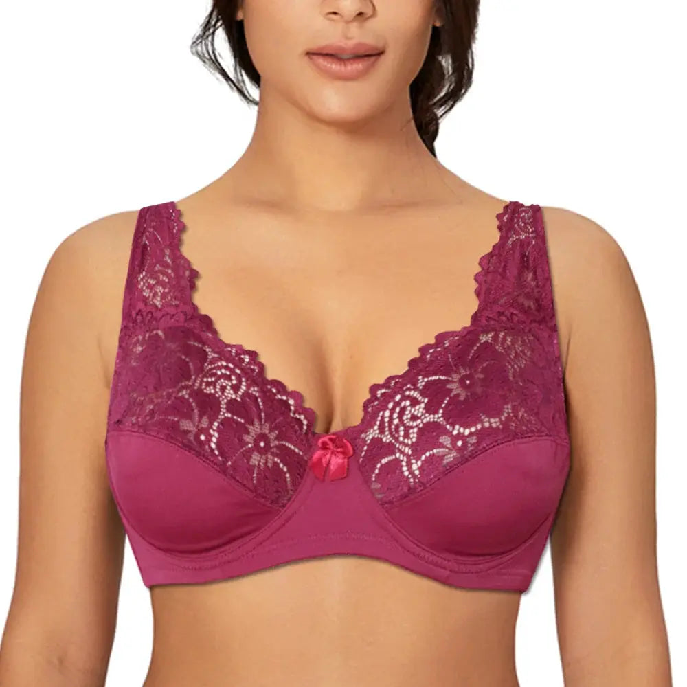 Plus-size women's magenta lace underwire bra with scalloped cups and center bow