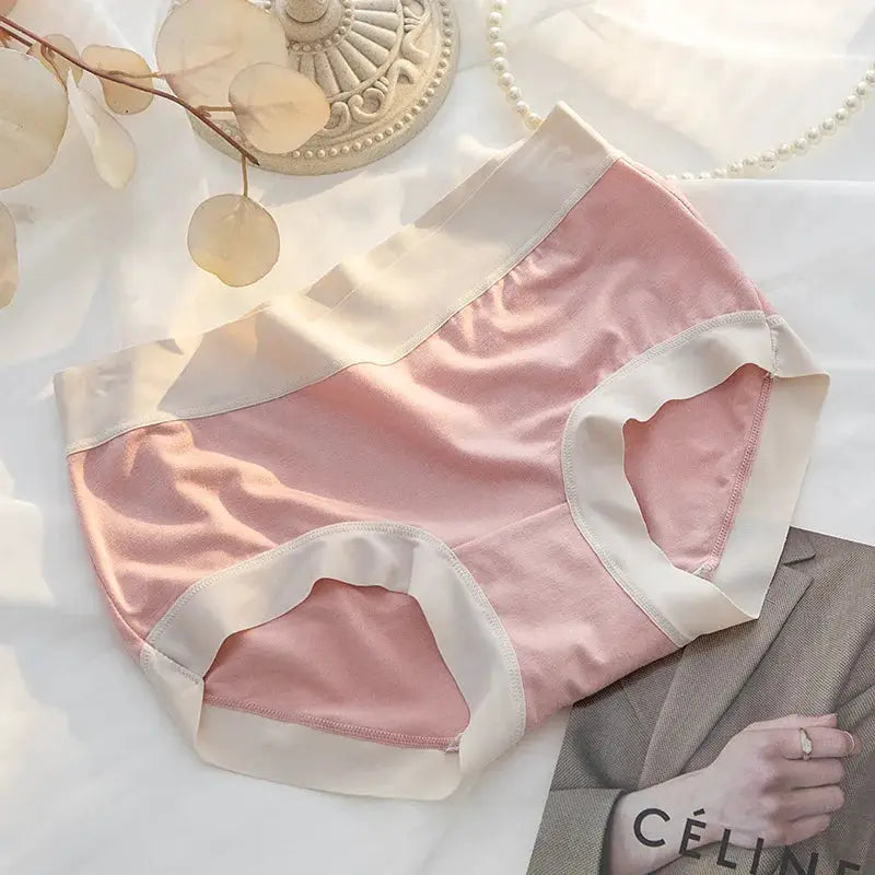 Women's pink and white panties with white waistband and leg trims, seamless style