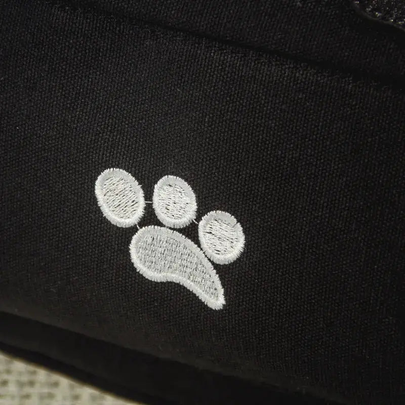 Backpack with white paw embroidery on black fabric, large-capacity everyday bag