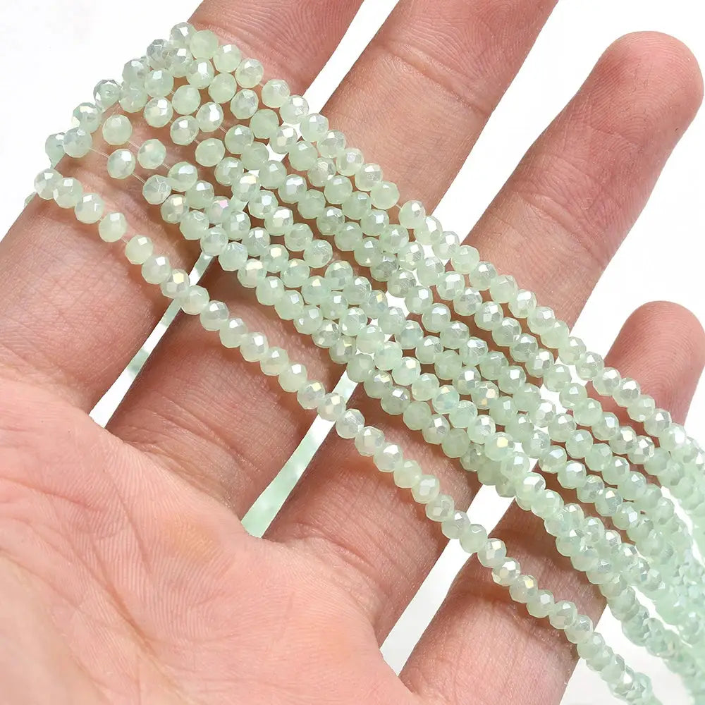 Crystal glass rondelle beads, 4mm faceted, pastel green; pack of 120