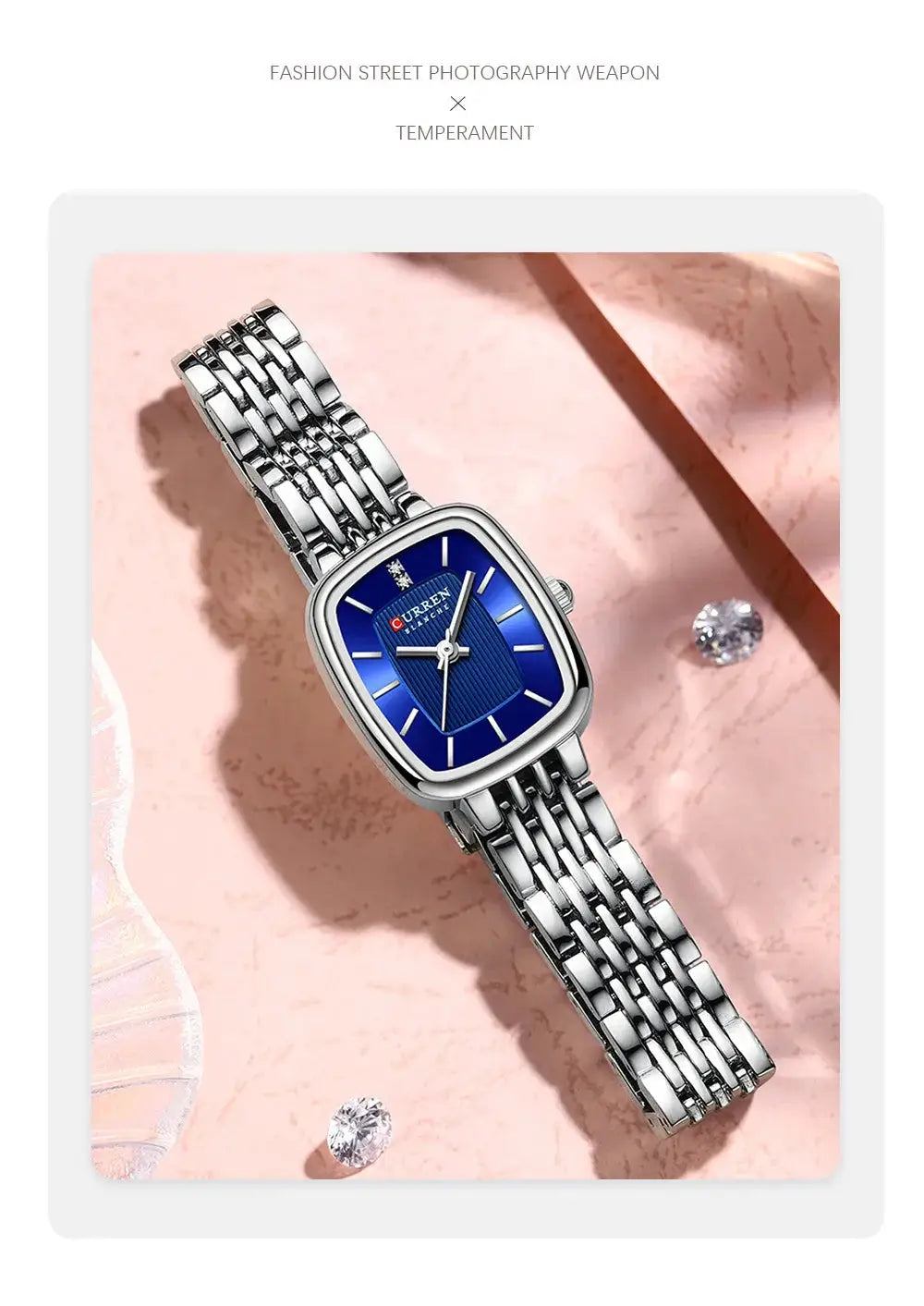 CURRN 9093 women's quartz watch with blue dial and silver stainless-steel bracelet.