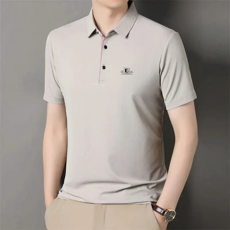 Men's polo shirt by Simples Market, light beige solid color with small badge, short sleeves.