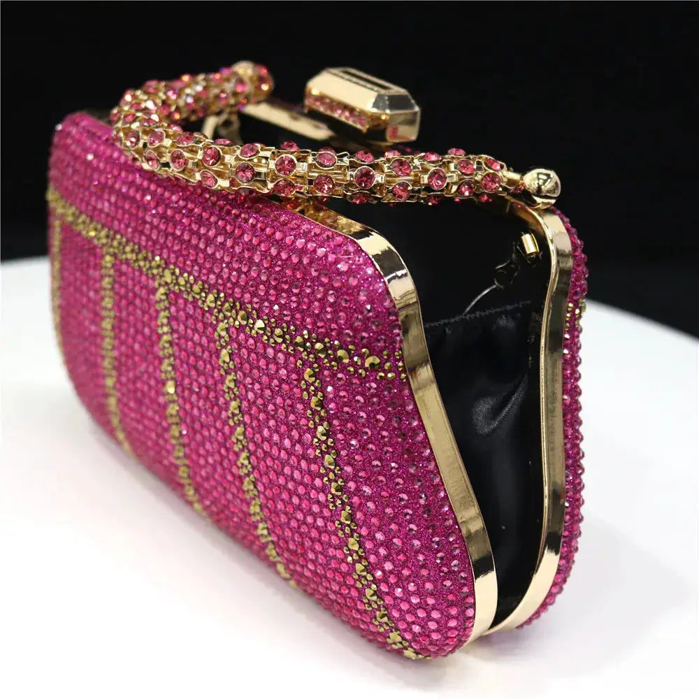 Evening clutch by Simples Market pink rhinestones with gold frame and gem-studded chain strap