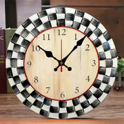 Wooden round wall clock with a black-and-white checkerboard border; silent movement