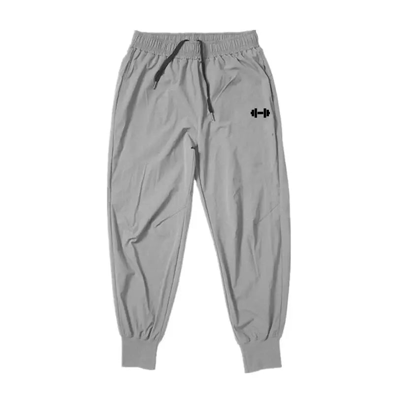 Men's gym training pants, gray with elastic waist, drawstring and cuffed ankles; quick-dry fabric