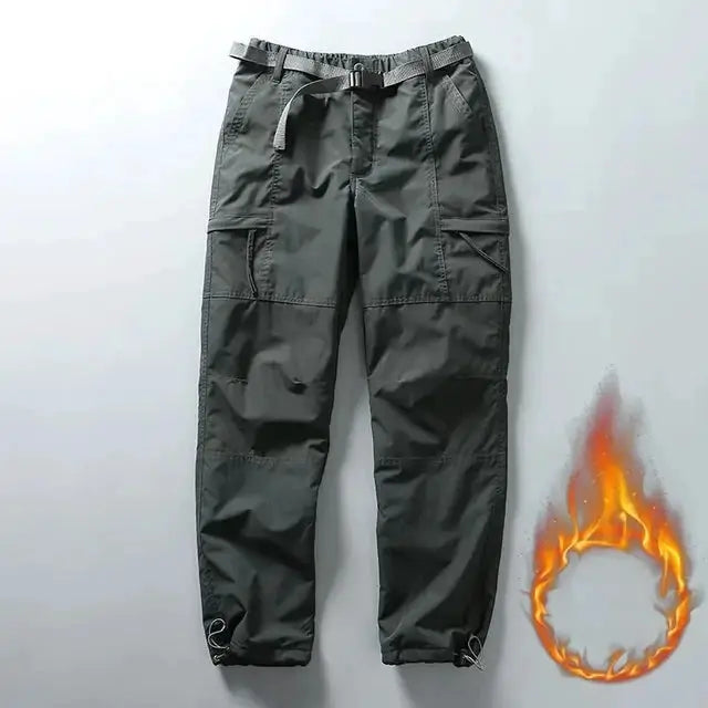 Tooling cargo pants in dark gray with belt and multi-pocket design.