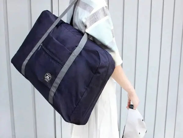 Simples Market large-capacity navy travel duffel bag with gray carrying handles