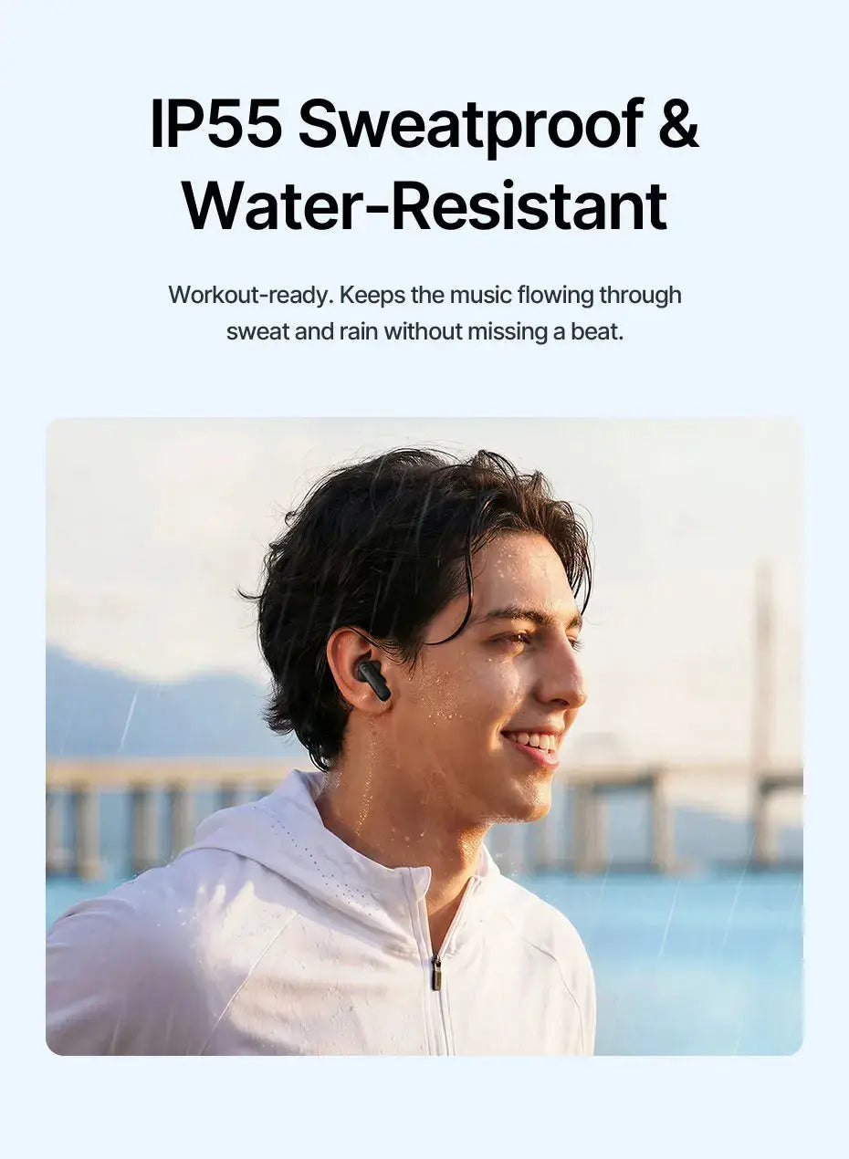Baseus Bass EP10 wireless earbuds, black, worn by man in rain outdoors.