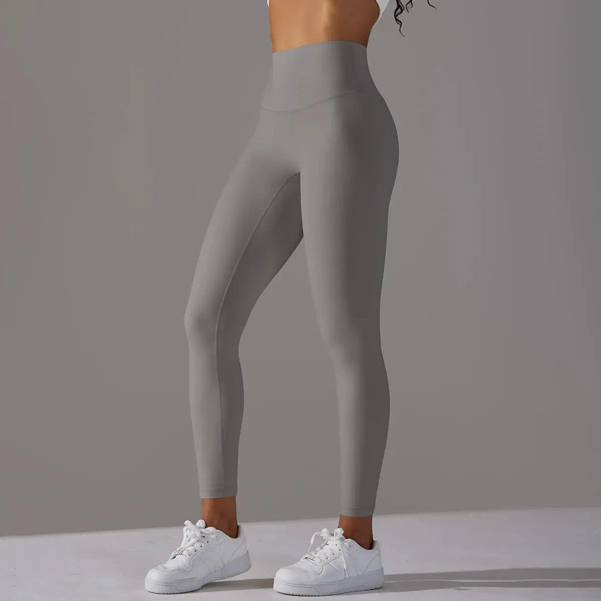 High-waist naked-feeling leggings for women in gray, ideal for fitness, running and yoga