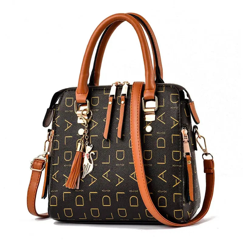 Fashion English Letter Handbag by Simples Market, black PU leather tote with tan handles, gold hardware, tassel charm