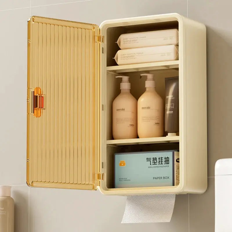 Simples Market bathroom wall-mounted storage cabinet with tissue box and shampoo bottles, beige with gold-toned door.