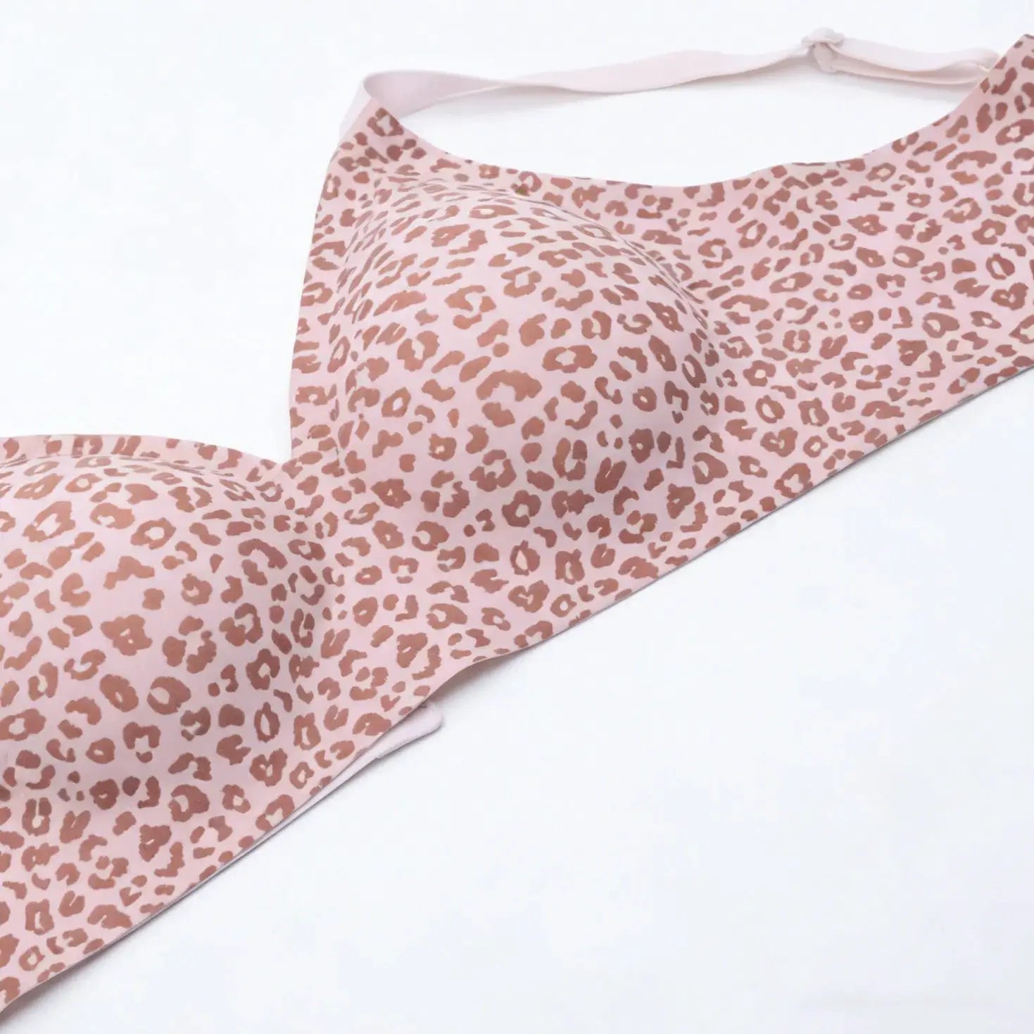 Women's seamless pink leopard print bra with full cups, wire-free and soft molded support