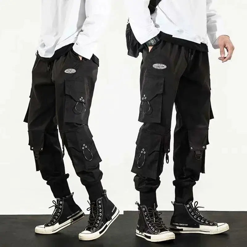 Cargo pants Simples Market black with multiple pockets and D-ring accents; 2 pairs shown