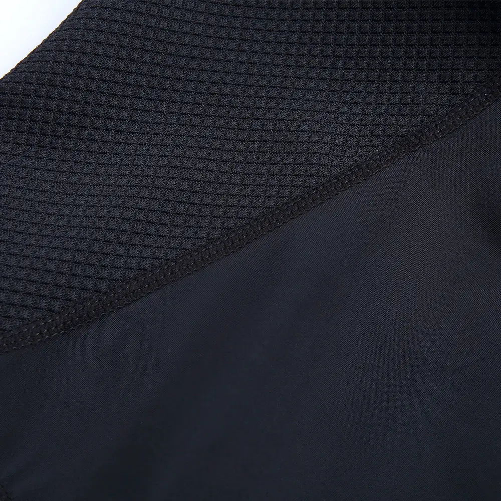 YKYWBIKE cycling jersey set in black, featuring a textured mesh upper and smooth fabric panel.