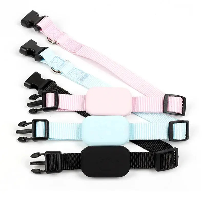 Remote pet GPS tracker collar set with four waterproof straps in pink, blue, and black; real-time tracking.