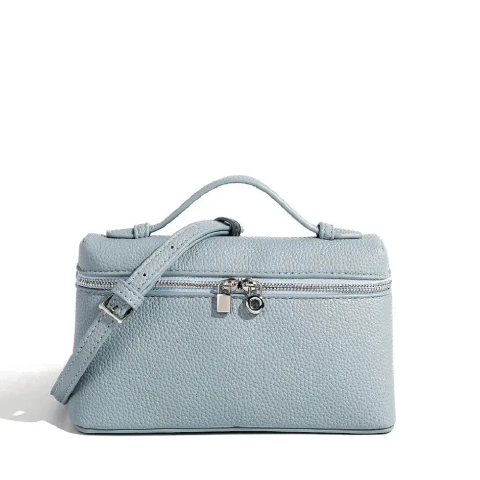 Simples Market mini lychee-grain shoulder bag in light blue with top handle and removable crossbody strap