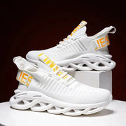 Unisex running sneakers by Simples Market, white with breathable knit upper and yellow accents (pair)