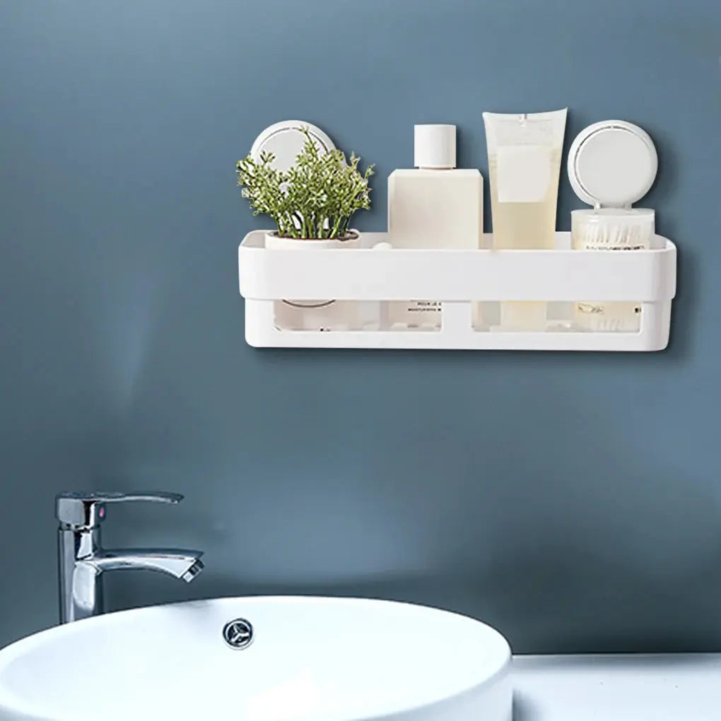 Shower suction cup shelf with draining basket, white; bathroom storage by Simples Market holding plant and toiletries