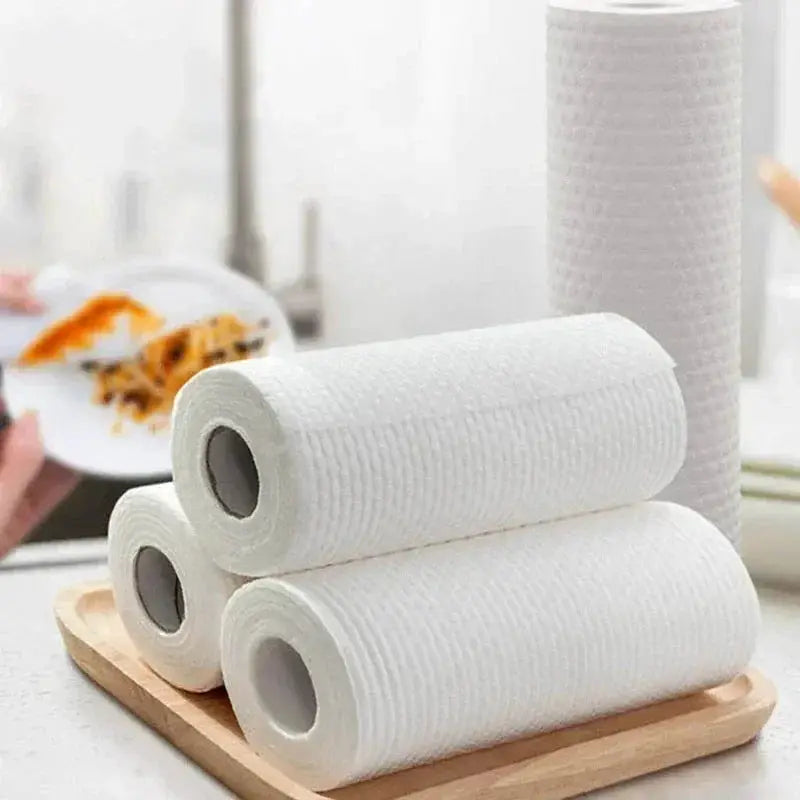 Kitchen disposable non-woven cleaning cloth rolls, white, 3 rolls on a wooden tray