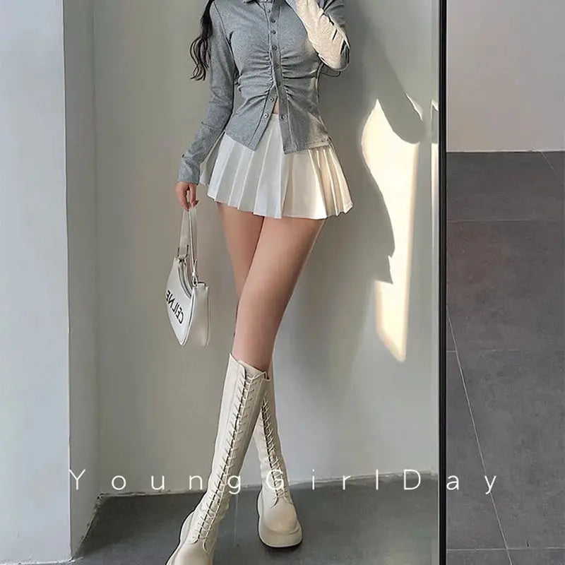 Pleated skirt with built-in shorts, white high-waisted A-line mini skirt