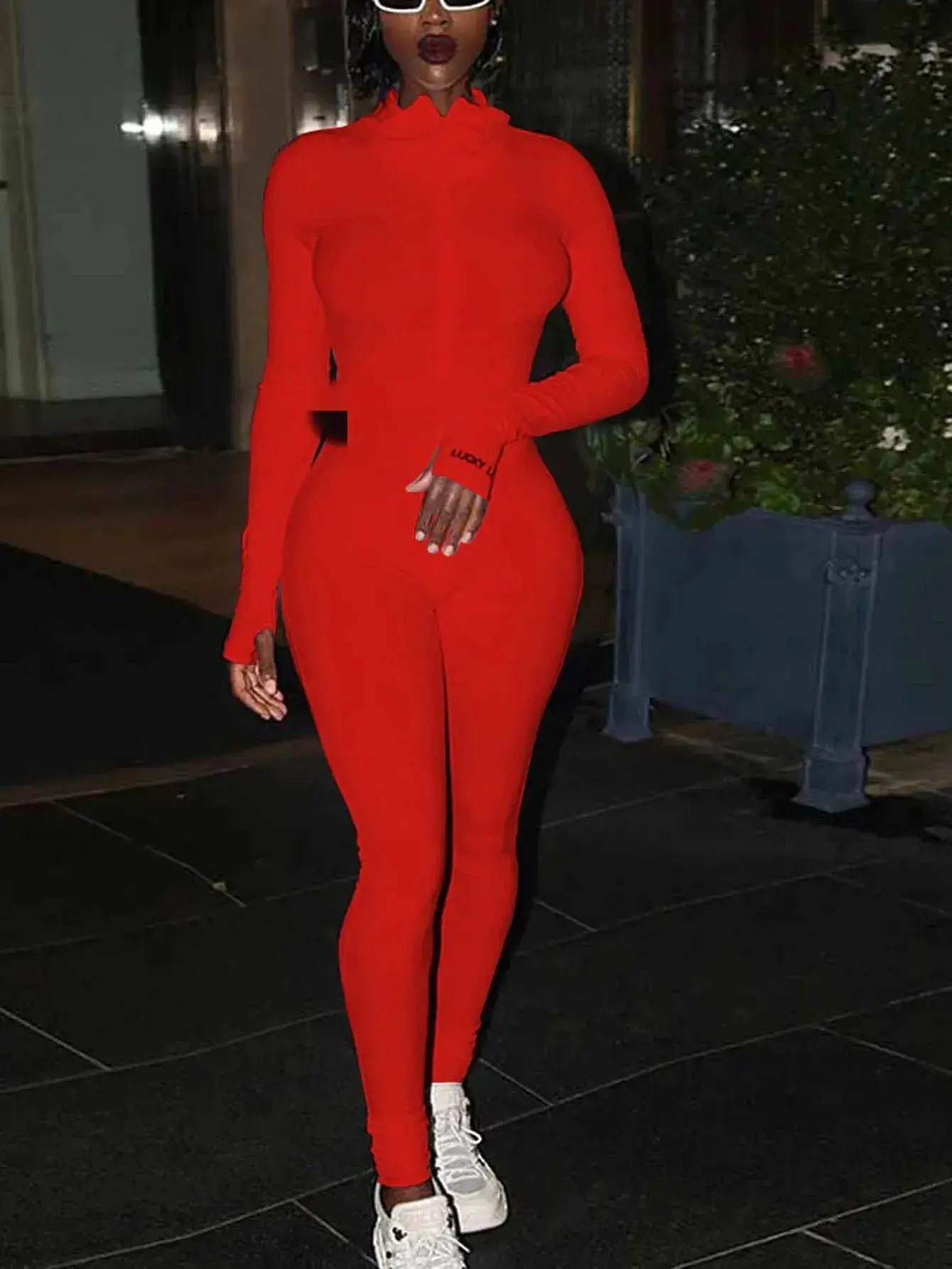Red knit women's bodycon jumpsuit with long sleeves and slim-fit streetwear style