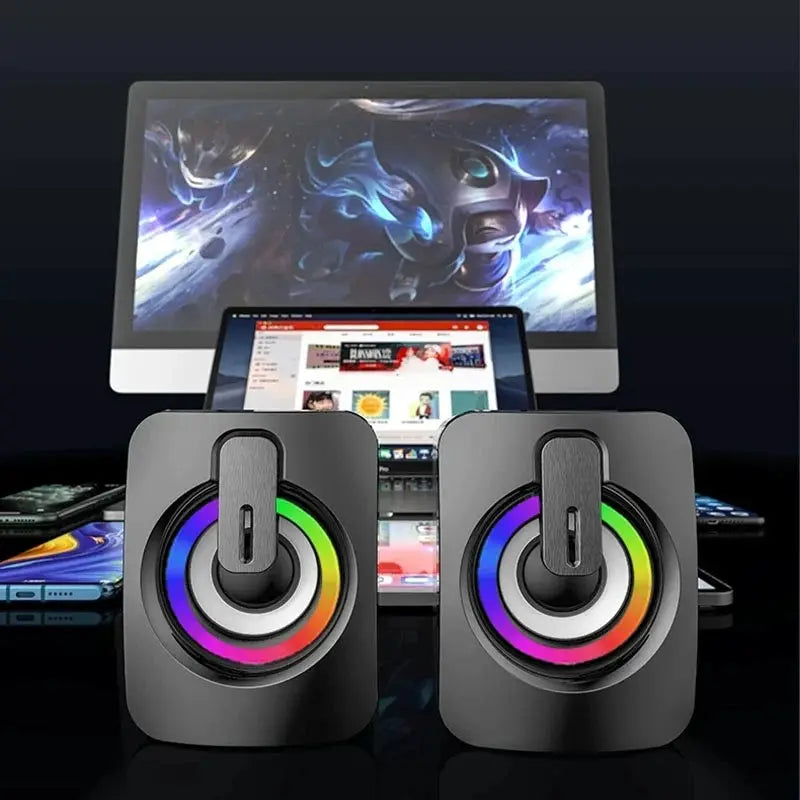 Simples Market computer speakers pair of black desktop stereo speakers with rainbow RGB rings.