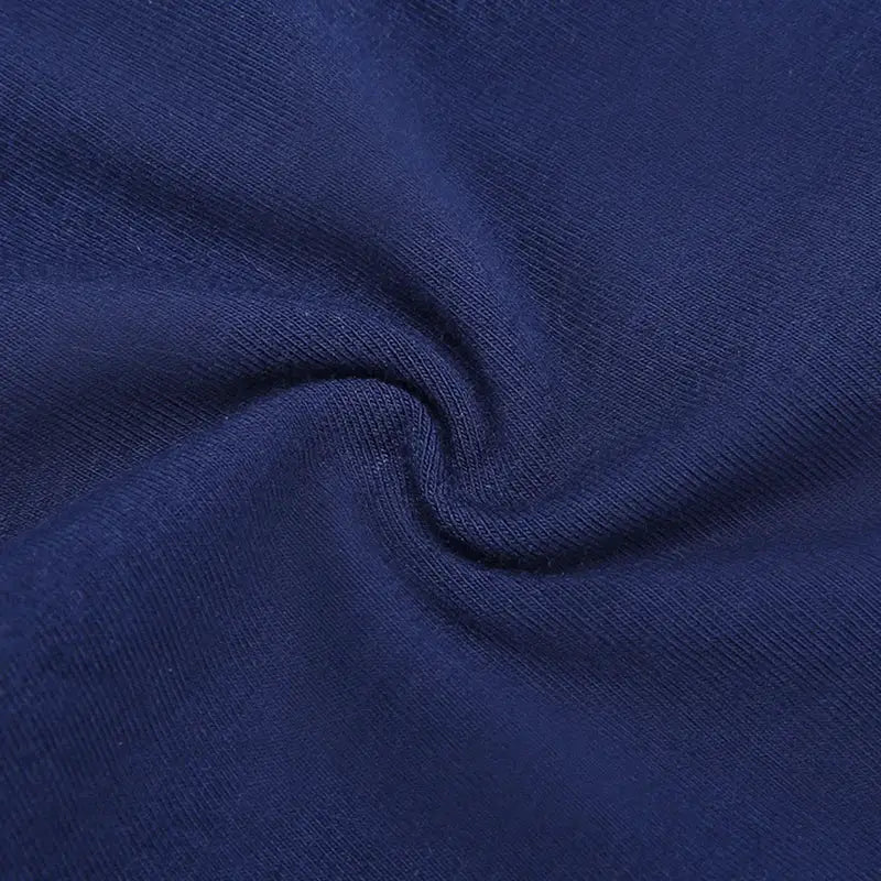 Boxer shorts fabric in navy blue, cotton weave close-up showing soft texture