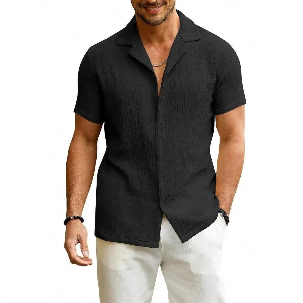 Men's black short-sleeve button-front shirt with lightweight textured fabric.