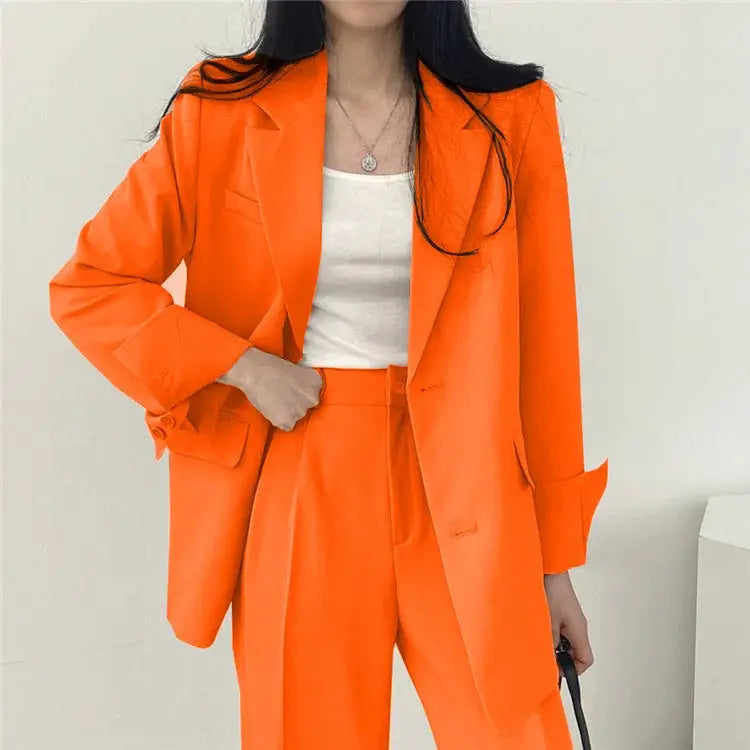 Two-piece orange blazer and pants set for women with long sleeves