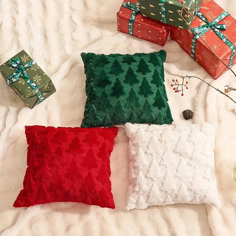 Decorative Christmas pillow covers; textured tree pattern in red, green, and white, three shown