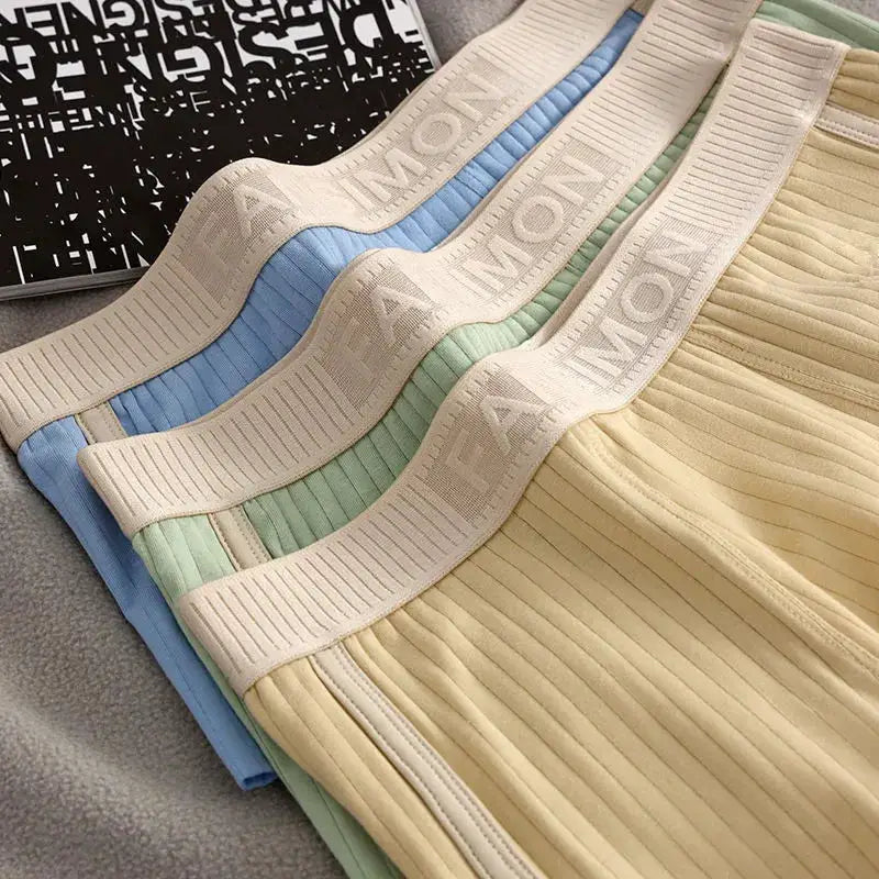 Men's striped boxer shorts, 4-pair pastel set with ribbed fabric and beige elastic waistband.