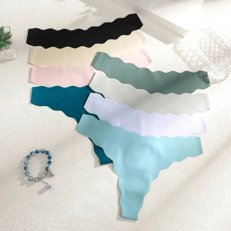 9pcs seamless G-string underwear set in assorted colors, low-rise, ultra-soft breathable fabric.