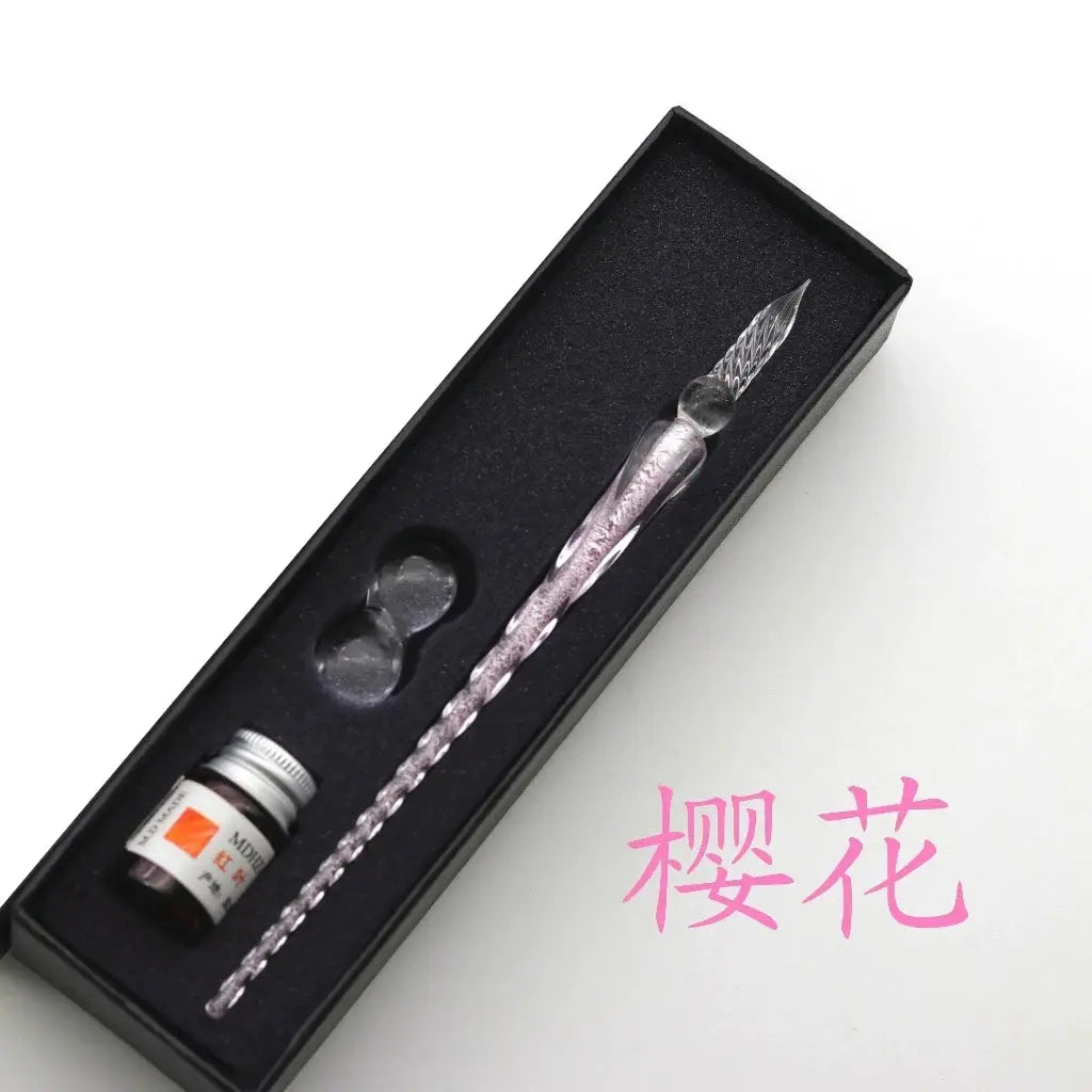 Crystal glass dip pen set in black gift box with ink bottle; pink swirled handle and crystal nib