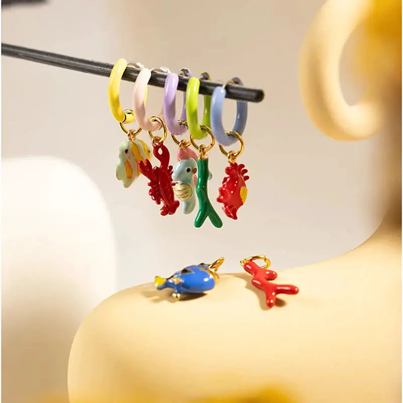 Simples Market cartoon animal pendant hoop earrings set: six pastel hoops with tiny animal charms