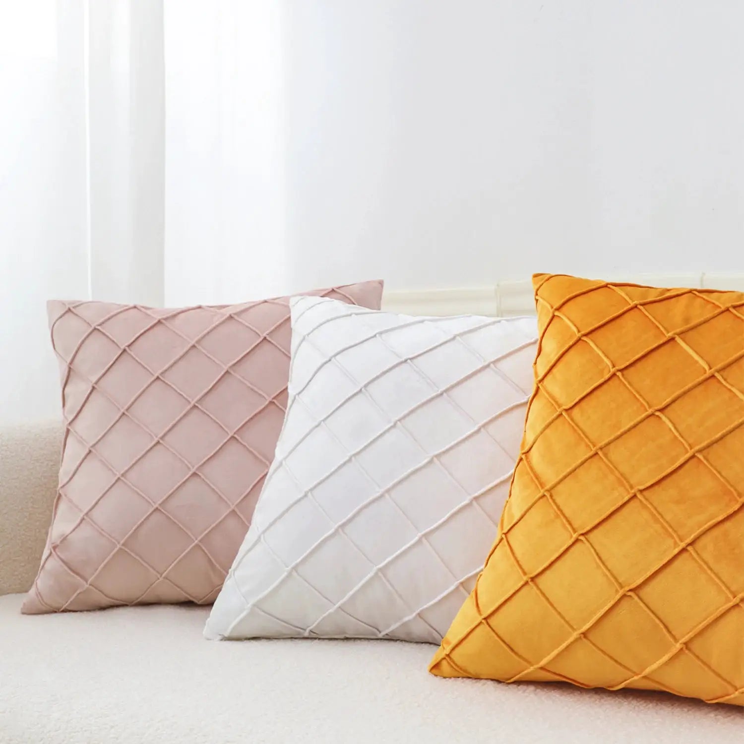 Set of three velvet cushion covers (45x45cm) with diamond quilted lattice in pink, white and orange
