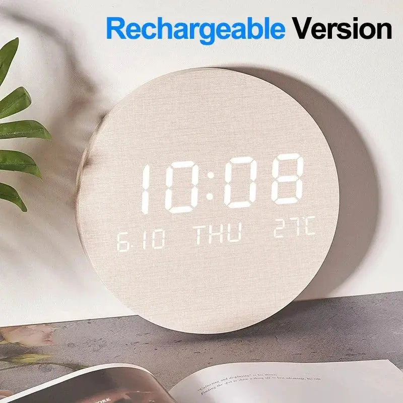 Round beige fabric LED digital wall clock displaying time, date and temperature.