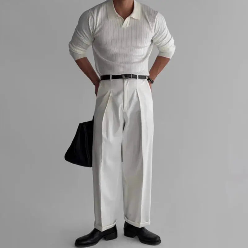 Men's white knitted polo shirt with V-neck by Simples Market, long sleeves, paired with white pleated trousers