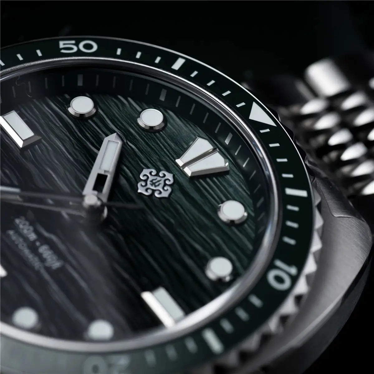 IXDAO IPOSE 2026 men's automatic diving watch with green textured dial and stainless steel bracelet