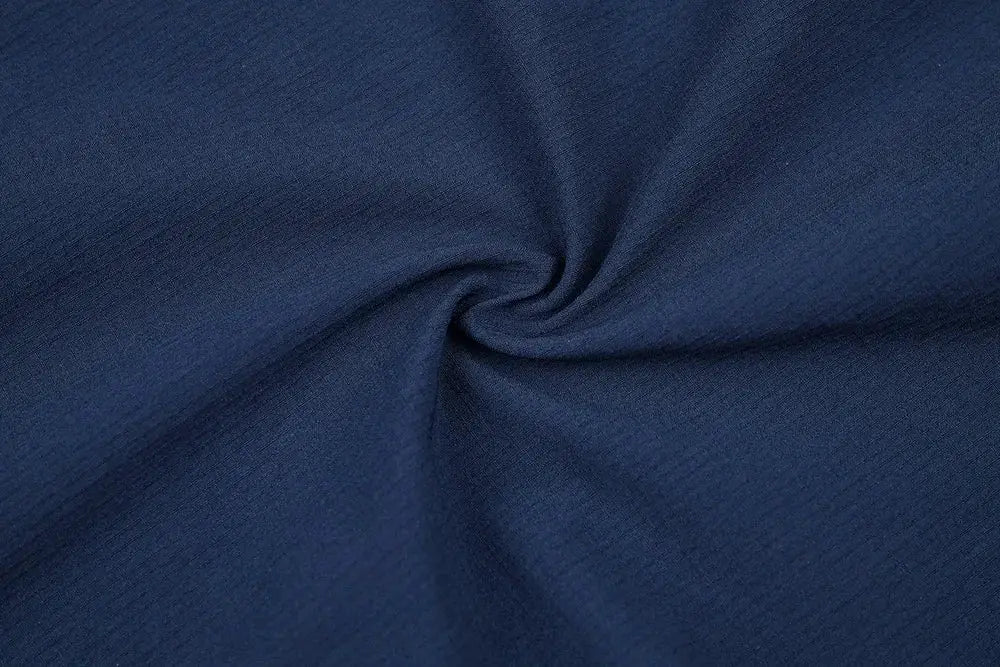Navy blue cycling vest fabric swatch with subtle texture