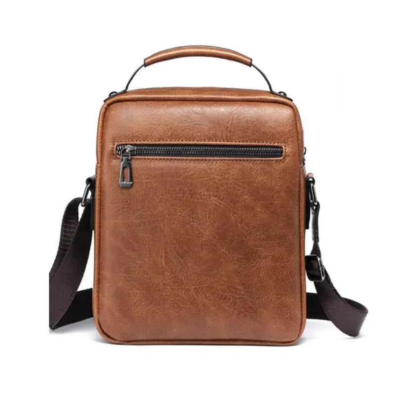 Men's brown leather crossbody shoulder bag with top handle and front zipper pocket