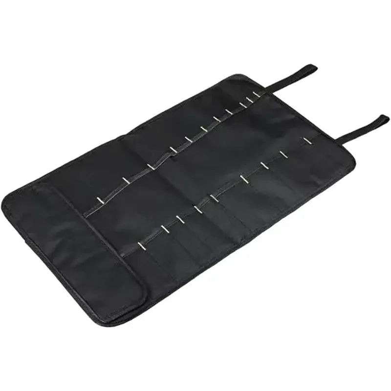 Roll Tool Bag by Simples Market, black heavy-duty nylon tool roll with folding pockets.