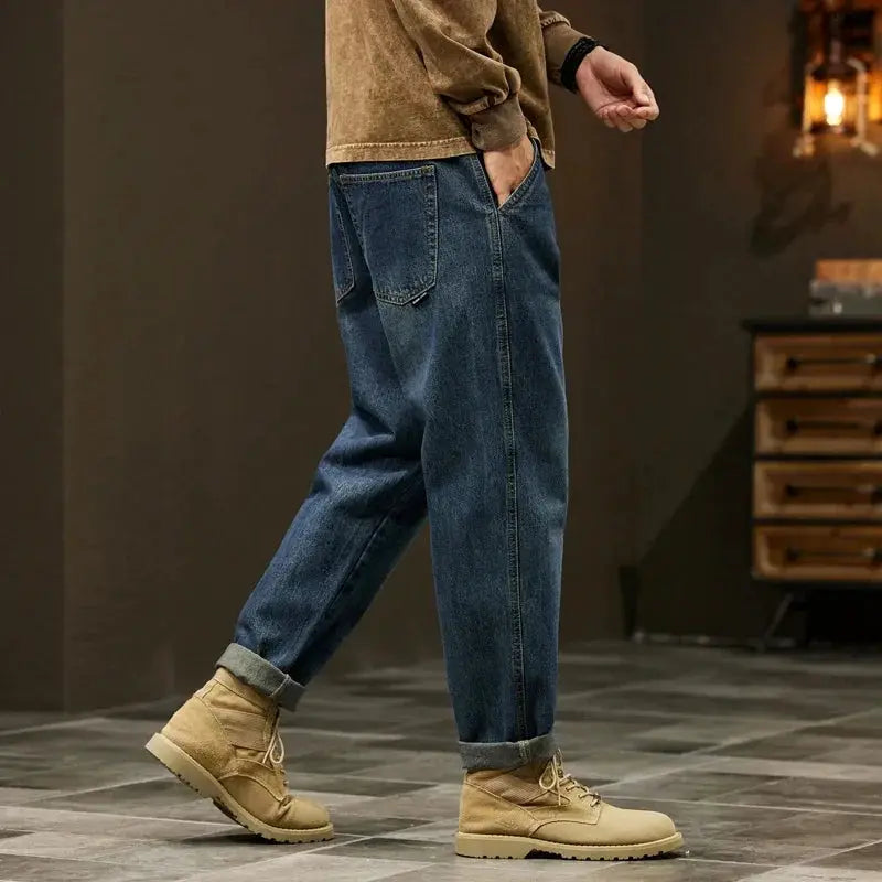 Men's loose-fit denim jeans with baggy harem style, blue denim, rolled cuffs