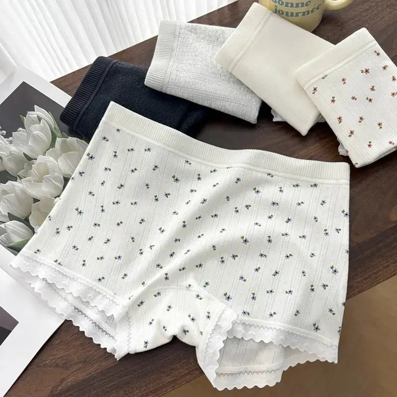 3-pack women's mid-waist lace-trim panties set in white with tiny blue floral print