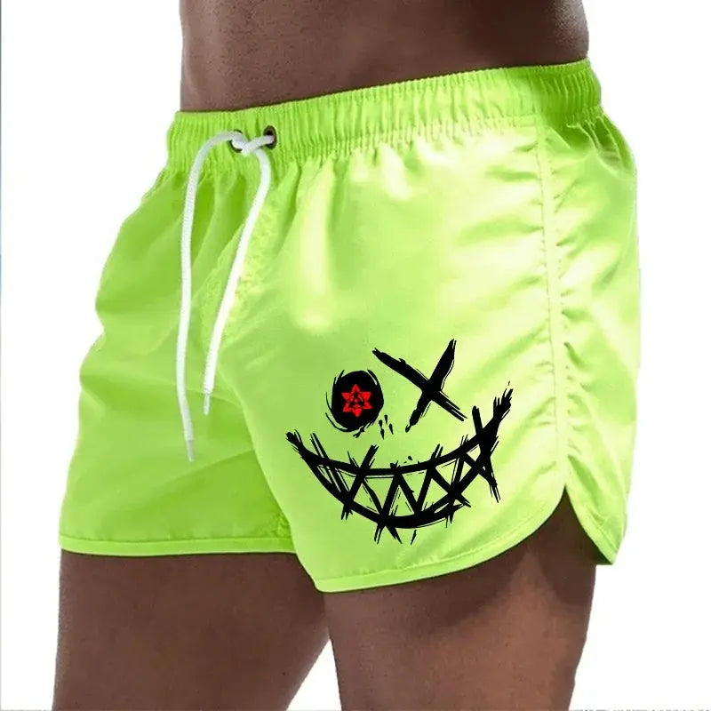 Simples Market bright lime-green men's board shorts with white drawstring and graphic smiley design.