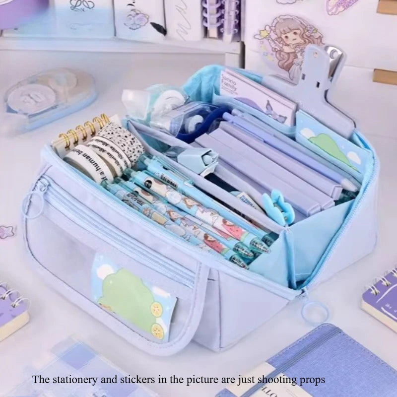 Large-capacity learning pencil case in light blue with multiple storage compartments and desktop organizer features