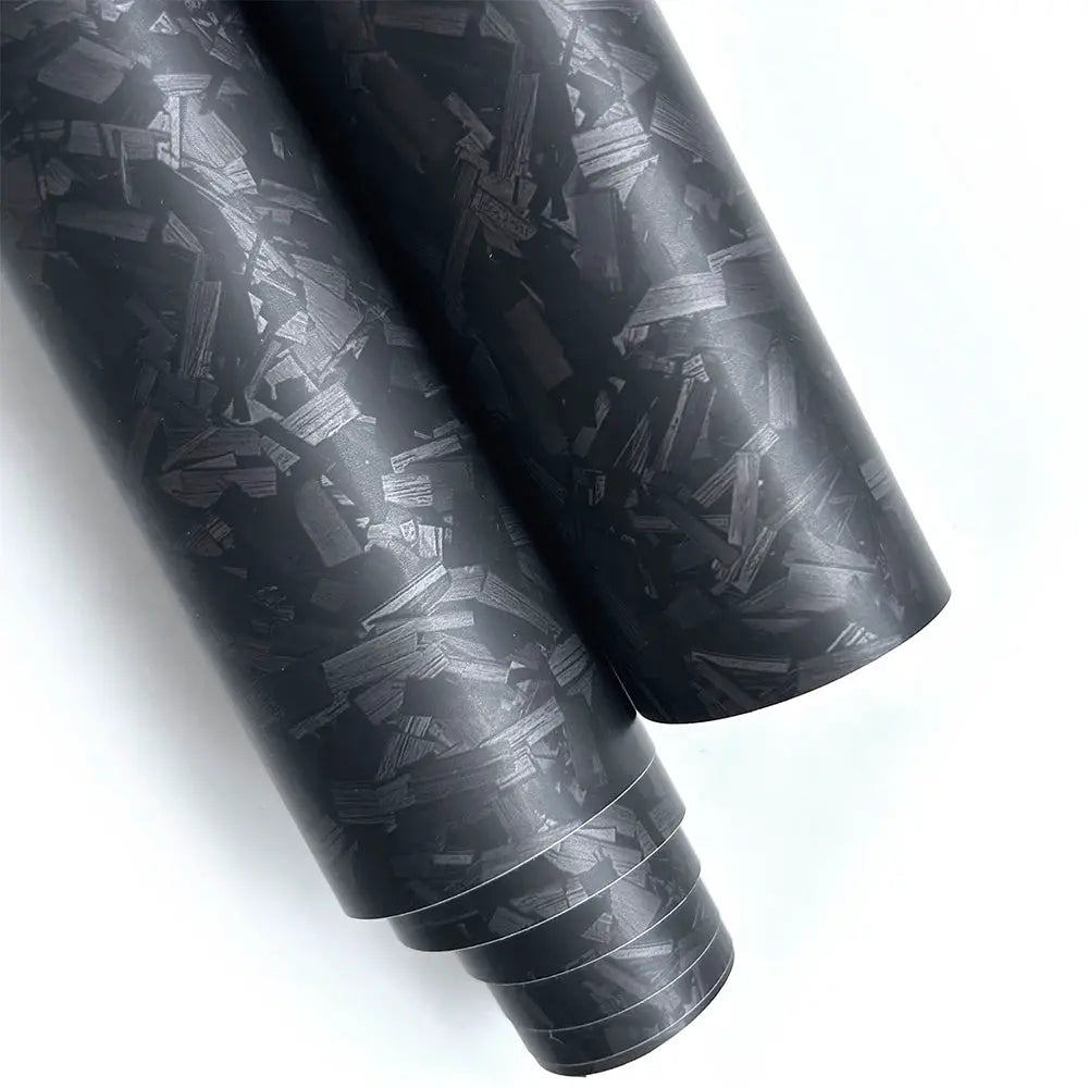 Two rolls of Simples Market 9D carbon fiber car vinyl wrap, glossy black, self-adhesive, anti-scratch.