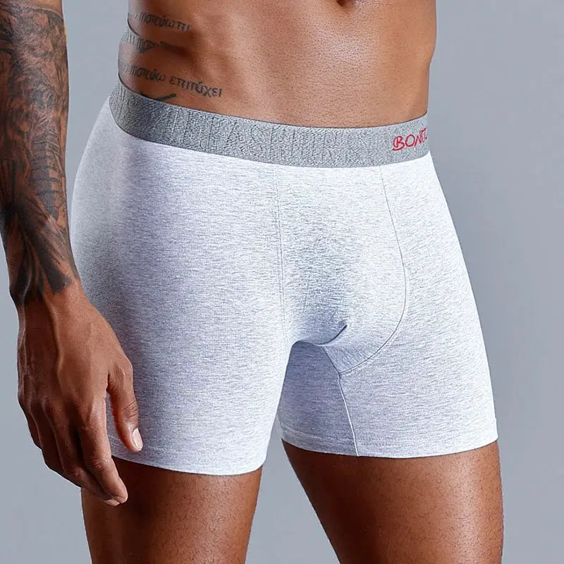 Simples Market men's cotton boxer briefs in light heather gray with metallic gray waistband and BON logo