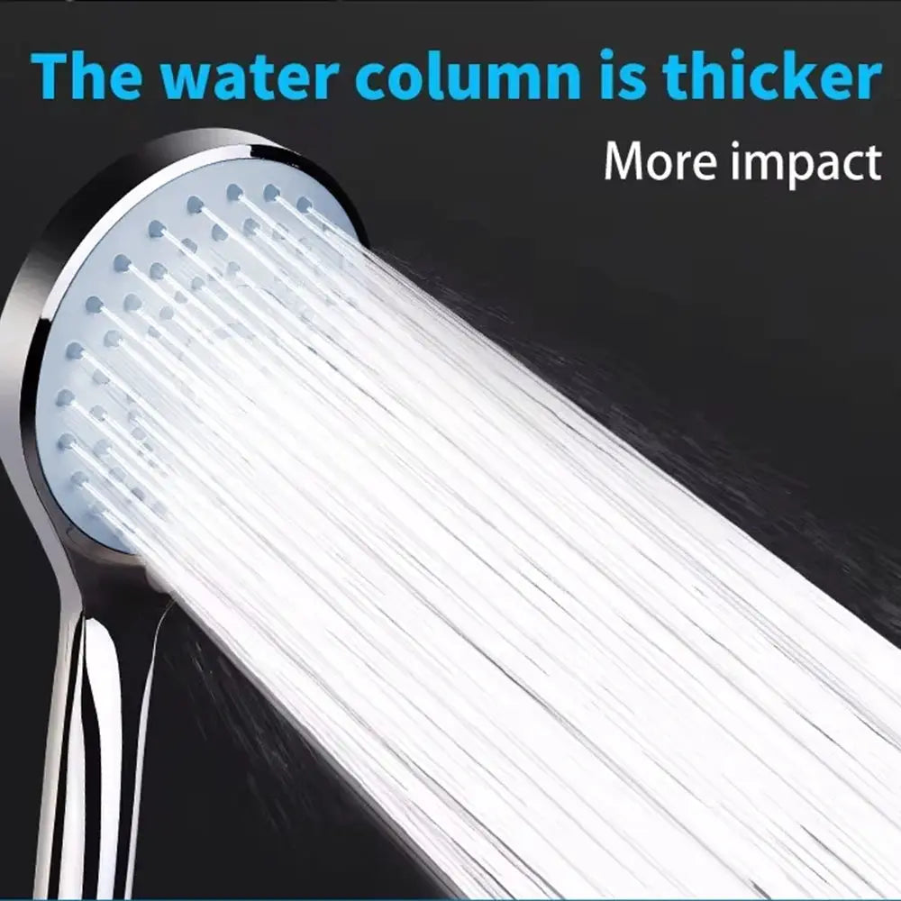 Chrome handheld shower head with high-output spray delivering a strong water stream.