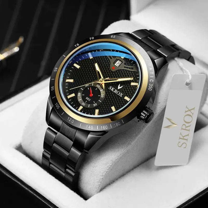 SKROX men's wristwatch; black stainless steel, gold bezel, blue inner ring, date window, automatic movement.